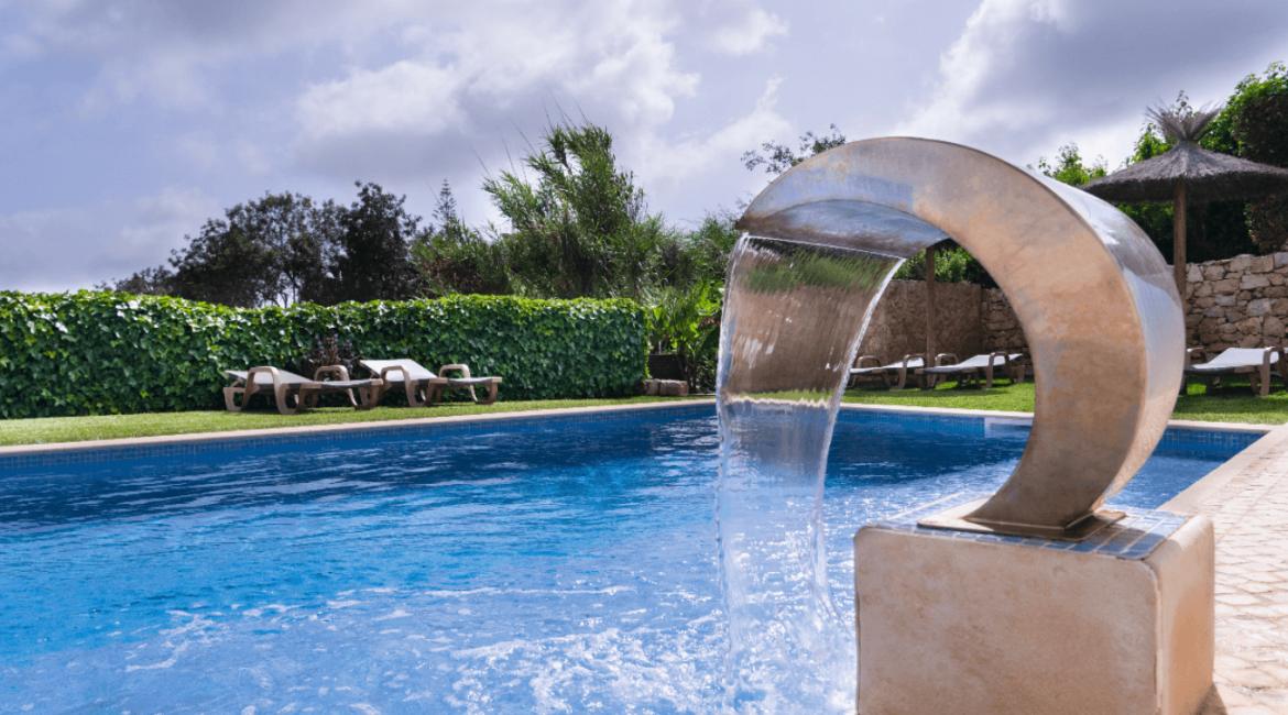 Saltwater swimming pool at Algarve Sunrise Lodge, a private holiday home in Paderne, Algarve